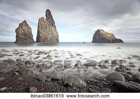 "Volcanic rock formations at the cliffs near Ribeira da Janela, Atlantic Ocean, Madeira, Portugal, Europe" View Large Photo Image Stock Photo - "Volcanic rock formations at the cliffs near Ribeira da Janela, Atlantic Ocean, Madeira, Portugal, Europe". Fotosearch