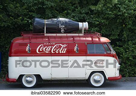 Stock Image - "Volkswagen Type 2, VW Bus T1, Bulli, built in 1950, with advertisements for Coca-Cola, Landshut, Lower Bavaria, Bavaria, Germany, Europe". Fotosearch