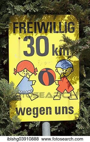 "Voluntary 30-kph speed sign in a residential area, Germany, Europe" View Large Photo Image Stock Photo - "Voluntary 30-kph speed sign in a residential area, Germany, Europe". Fotosearch