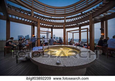 "Vue Bar with jacuzzi, Hyatt on the Bund Hotel, at the back the skyline of Pudong, Shanghai, China, Asia" View Large Photo Image Stock Photo - "Vue Bar with jacuzzi, Hyatt on the Bund Hotel, at the back the skyline of Pudong, Shanghai, China, Asia". Fotosearch