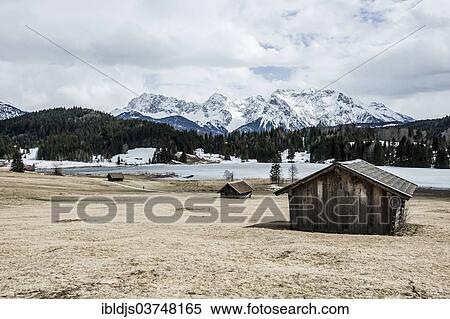 "Wagenbruechsee Lake, late winter landscape with the lake and snow-covered Alps, Gerold, Mittenwald, Upper Bavaria, Bavaria, Germany, Europe" View Large Photo Image Stock Photography - "Wagenbruechsee Lake, late winter landscape with the lake and snow-covered Alps, Gerold, Mittenwald, Upper Bavaria, Bavaria, Germany, Europe". Fotosearch