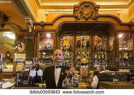 "Waiter with wine bottles and glasses, Cafe Majestic, Art Nouveau cafe, Porto, District of Porto, Portugal, Europe" View Large Photo Image Stock Image - "Waiter with wine bottles and glasses, Cafe Majestic, Art Nouveau cafe, Porto, District of Porto, Portugal, Europe". Fotosearch