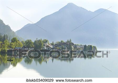 Stock Photo - "Walchensee on Lake Walchen with a fishing boat, Jochberg Mountain at the rear, Walchensee, Kochel am See, Upper Bavaria, Bavaria, Germany, Europe". Fotosearch