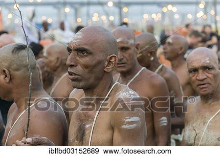 Stock Photo - "Walking back to the Akhara as part of the initiation of new sadhus, during Kumbha Mela festival, Allahabad, Uttar Pradesh, India, Asia". Fotosearch