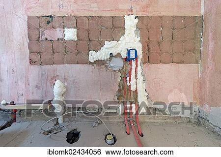 "Wall cavities filled with foam insulation, installations for a bathroom, renovation of an old building, Stuttgart, Baden-Wuerttemberg, Germany, Europe" View Large Photo Image Stock Photograph - "Wall cavities filled with foam insulation, installations for a bathroom, renovation of an old building, Stuttgart, Baden-Wuerttemberg, Germany, Europe". Fotosearch