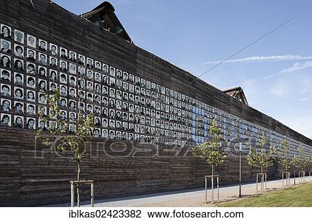 Wall of a Thousand Faces, wooden wall covered with portraits hiding a steel plant, Rhine Park Duisburg, Duisburg-Hochfeld, Ruhr area, North Rhine-Westphalia, Germany, Europe View Large Photo Image Stock Image - Wall of a Thousand Faces, wooden wall covered with portraits hiding a steel plant, Rhine Park Duisburg, Duisburg-Hochfeld, Ruhr area, North Rhine-Westphalia, Germany, Europe. Fotosearch