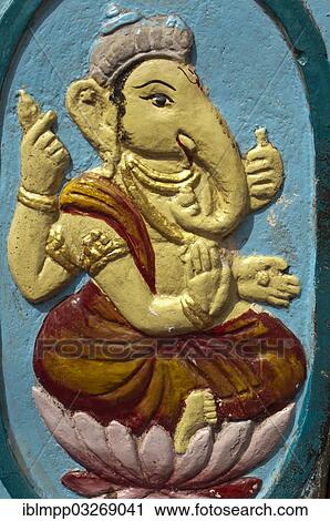 Stock Image - "Wall relief, Indian god Ganesha". Fotosearch