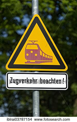 "Warning """"attention, trains"""" at the station of Diessen on Lake Ammer, Upper Bavaria, Bavaria, Germany, Europe" View Large Photo Image Picture - "Warning """"attention, trains"""" at the station of Diessen on Lake Ammer, Upper Bavaria, Bavaria, Germany, Europe". Fotosearch