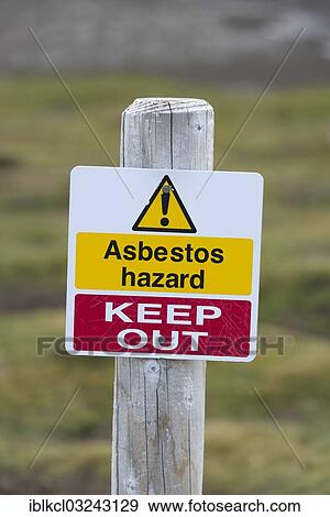 "Warning sign """"Asbestos hazard - keep out"""" at the Stromness whaling station, Stromness Bay, South Georgia and the South Sandwich Islands, United Kingdom, Antarctica" View Large Photo Image Stock Photo - "Warning sign """"Asbestos hazard - keep out"""" at the Stromness whaling station, Stromness Bay, South Georgia and the South Sandwich Islands, United Kingdom, Antarctica". Fotosearch