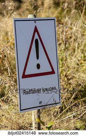 Warning sign, lettering Radfahrer kreuzen, German for cyclists crossing, bike park, downhill mountain bike trail at the Winterberg bobsleigh track, Sauerland, North Rhine-Westphalia, Germany, Europe View Large Photo Image Stock Photo - Warning sign, lettering Radfahrer kreuzen, German for cyclists crossing, bike park, downhill mountain bike trail at the Winterberg bobsleigh track, Sauerland, North Rhine-Westphalia, Germany, Europe. Fotosearch