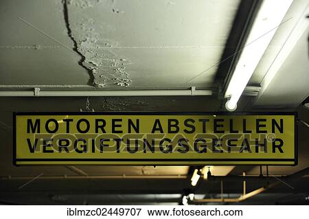 "Warning sign, Motoren abstellen Vergiftungsgefahr, German for Stop engines, risk of poisoning, warning of poison gas in a car park, Mannheim, Baden-Wurttemberg, Germany, Europe" View Large Photo Image Stock Photo - "Warning sign, Motoren abstellen Vergiftungsgefahr, German for Stop engines, risk of poisoning, warning of poison gas in a car park, Mannheim, Baden-Wurttemberg, Germany, Europe". Fotosearch