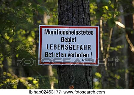 "Warning sign """"Munitionsbelastetes Gebiet, Lebensgefahr, Betreten verboten"""", German for """"ammunition contaminated area, danger to life, no trespassing"""", forest around Peenemuende, Usedom Island, Mecklenburg-Western Pomerania, Germany, Europe" View Large Photo Image Stock Photo - "Warning sign """"Munitionsbelastetes Gebiet, Lebensgefahr, Betreten verboten"""", German for """"ammunition contaminated area, danger to life, no trespassing"""", forest around Peenemuende, Usedom Island, Mecklenburg-Western Pomerania, Germany, Europe". Fotosearch