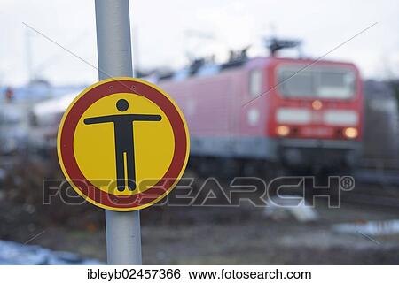 Stock Photograph - "Warning sign on a railway platform, prohibited passageway, Stuttgart, Baden-Wuerttemberg, Germany, Europe". Fotosearch