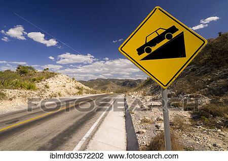"Warning sign on a sloping road, Coahuila, Mexico, North America" View Large Photo Image Stock Image - "Warning sign on a sloping road, Coahuila, Mexico, North America". Fotosearch
