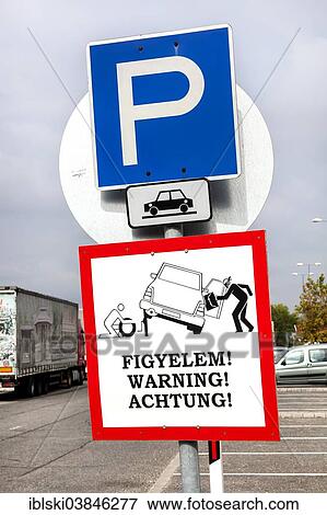 Stock Photo - "Warning sign, warning against robbery, at a highway rest area, near Budapest, Hungary, Europe". Fotosearch