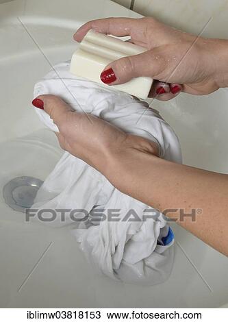 Washing by hand with German curd soap in a washbasin View Large Photo Image Stock Image - Washing by hand with German curd soap in a washbasin. Fotosearch