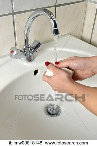 Washing hands with German curd soap in a washbasin View Large Photo Image Stock Photography - Washing hands with German curd soap in a washbasin. Fotosearch