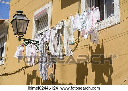 "Washing line in front of house, Rua de Pedro Diaz, Lisboa, Lisbon, Portugal, Europe" View Large Photo Image Picture - "Washing line in front of house, Rua de Pedro Diaz, Lisboa, Lisbon, Portugal, Europe". Fotosearch