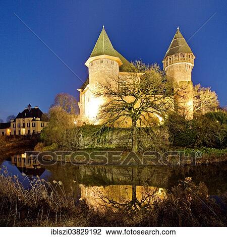 "Wasserschloss Burg Linn, a moated castle in Krefeld-Linn, illuminated at dusk, Lower Rhine region, Westphalia, North Rhine-Westphalia, Germany, Europe" View Large Photo Image Stock Image - "Wasserschloss Burg Linn, a moated castle in Krefeld-Linn, illuminated at dusk, Lower Rhine region, Westphalia, North Rhine-Westphalia, Germany, Europe". Fotosearch