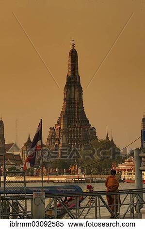 Stock Photography - "Wat Arun or """"Temple of Dawn"""" on the Chao Phraya River just after sunrise, Thonburi, Bangkok, Bangkok, Thailand, Asia". Fotosearch