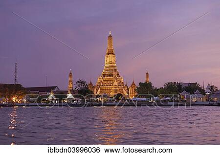 Stock Photograph - "Wat Arun, or Temple of The Dawn, and Chao Phraya River at sunset, Bangkok, Thailand, Asia". Fotosearch