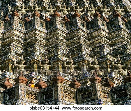 Picture - "Wat Arun, Temple of Dawn, monk looking out from the terraces, Bangkok, Central Thailand, Thailand, Asia". Fotosearch