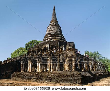 Stock Photograph - "Wat Chang Lom, step pyramid with standing elephant statues, Si Satchanalai Historical Park, Si Satchanalai, Sukhothai Province, Northern Thailand, Thailand, Asia". Fotosearch