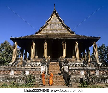 Stock Photo - "Wat Ho Prakeo, monks at the entrance, Ho Phra Keo Temple, National Museum, Vientiane, Vientiane Province, Laos, Asia". Fotosearch