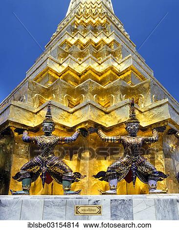 Picture - "Wat Phra Kaeo Temple, Royal Palace, Caryatid demons on a golden chedi, Bangkok, Central Thailand, Thailand, Asia". Fotosearch
