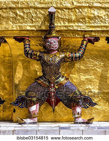 "Wat Phra Kaeo Temple, Royal Palace, Caryatid demon on a golden chedi, Bangkok, Central Thailand, Thailand, Asia" View Large Photo Image Stock Photography - "Wat Phra Kaeo Temple, Royal Palace, Caryatid demon on a golden chedi, Bangkok, Central Thailand, Thailand, Asia". Fotosearch