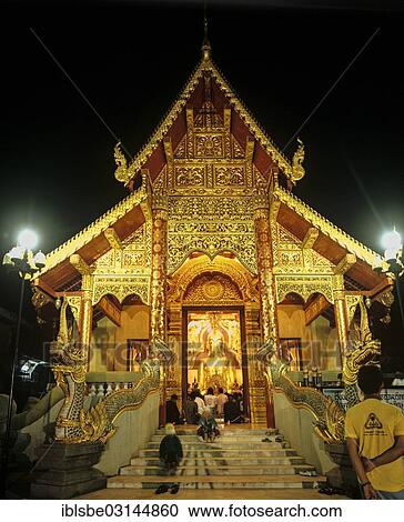 "Wat Phra Kaew Temple, Golden Buddha statue illuminated at night, Chiang Rai, Chiang Rai Province, Northern Thailand, Thailand, Asia" View Large Photo Image Stock Image - "Wat Phra Kaew Temple, Golden Buddha statue illuminated at night, Chiang Rai, Chiang Rai Province, Northern Thailand, Thailand, Asia". Fotosearch