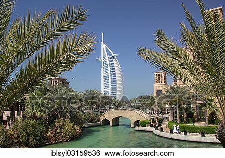 "Water channel at Madinat Jumeirah, Burj al Arab luxury hotel at back, Burj al Arab, Dubai, United Arab Emirates, Asia" View Large Photo Image Stock Photograph - "Water channel at Madinat Jumeirah, Burj al Arab luxury hotel at back, Burj al Arab, Dubai, United Arab Emirates, Asia". Fotosearch