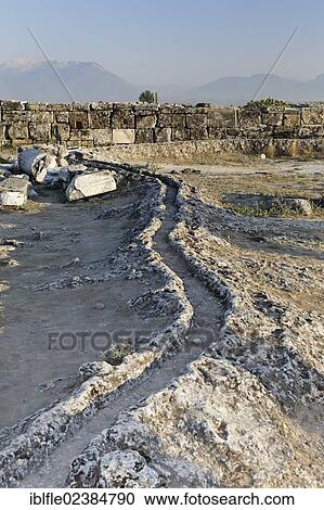 "Water channeling system at the ancient excavation site of Hierapolis, Hieropolis, near Pamukkale, Denizli, Western Turkey, Turkey, Asia" View Large Photo Image Stock Image - "Water channeling system at the ancient excavation site of Hierapolis, Hieropolis, near Pamukkale, Denizli, Western Turkey, Turkey, Asia". Fotosearch
