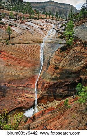"Water draining off over red Navajo sandstone rocks after a rainstorm near Canyon Overlook, Zion National Park, Utah, United States, North America" View Large Photo Image Stock Image - "Water draining off over red Navajo sandstone rocks after a rainstorm near Canyon Overlook, Zion National Park, Utah, United States, North America". Fotosearch