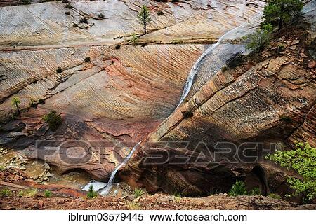 "Water draining off over red Navajo sandstone rocks after a rainstorm near Canyon Overlook, Zion National Park, Utah, United States, North America" View Large Photo Image Stock Photography - "Water draining off over red Navajo sandstone rocks after a rainstorm near Canyon Overlook, Zion National Park, Utah, United States, North America". Fotosearch