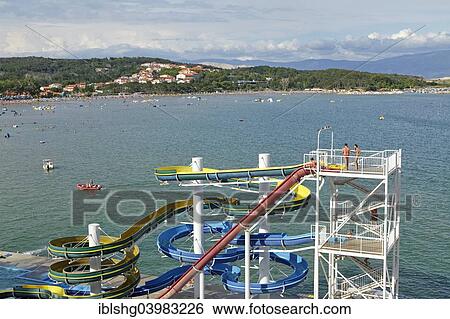 "Water slide on San Marino beach, Lopar, Rab, Kvarner Gulf, Croatia, Europe" View Large Photo Image Stock Photograph - "Water slide on San Marino beach, Lopar, Rab, Kvarner Gulf, Croatia, Europe". Fotosearch