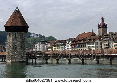 Stock Image - "Water tower with Chapel Bridge, behind Rathausquai and Chateau Gutsch, Lucerne, Lake Lucerne, Canton of Lucerne, Switzerland, Europe". Fotosearch
