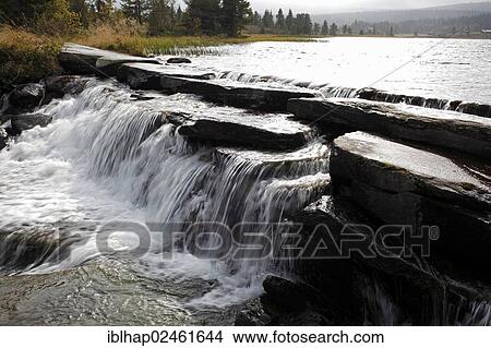 Picture - "Waterfall at a lake near Gala, Oppland, Norway, Northern Europe, Europe". Fotosearch