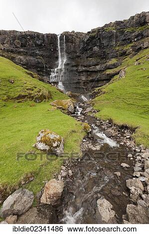 Stock Photograph - "Waterfall on the Faroe Islands, Denmark, Northern Europe, Europe". Fotosearch