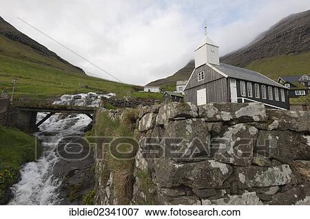 "Waterfall, wooden church in the community of Bour on Vagar Island, Faroe Islands, North Sea, Northern Europe, Europe" View Large Photo Image Stock Photo - "Waterfall, wooden church in the community of Bour on Vagar Island, Faroe Islands, North Sea, Northern Europe, Europe". Fotosearch
