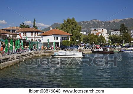 "Waterfront and boats moored in Ohrid harbour on Lake Ohrid, Ohrid, Macedonia, Europe" View Large Photo Image Stock Image - "Waterfront and boats moored in Ohrid harbour on Lake Ohrid, Ohrid, Macedonia, Europe". Fotosearch