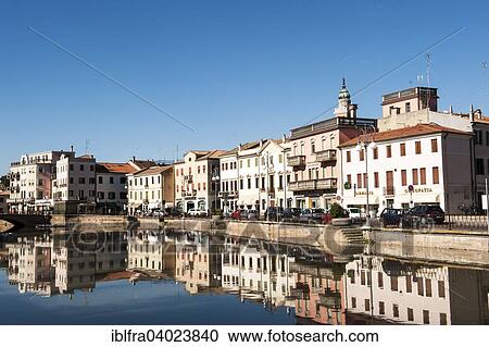 Stock Image - "Waterfront at the Canal Bianco, Adria town, province of Rovigo, Veneto, Italy, Europe". Fotosearch
