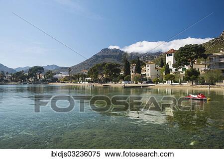 "Waterfront, mountains at back, Port de Pollenca, Majorca, Balearic Islands, Spain, Europe" View Large Photo Image Stock Photography - "Waterfront, mountains at back, Port de Pollenca, Majorca, Balearic Islands, Spain, Europe". Fotosearch