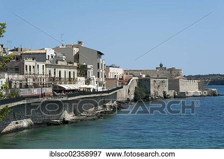 Stock Photo - "Waterfront promenade, cityscape with Castello Maniace Castle, Siracusa, Syracuse, Ortigia, Ortygia Island, Sicily, Italy, Europe". Fotosearch