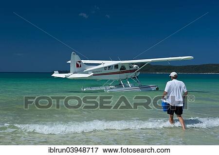 Stock Photo - "Waterplane in Whitehaven beach at the Whitsunday Islands, Queensland, Australia, Oceania". Fotosearch