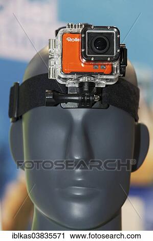 Stock Image - "Waterproof helmet camera or actioncam, attached to the head of a mannequin". Fotosearch