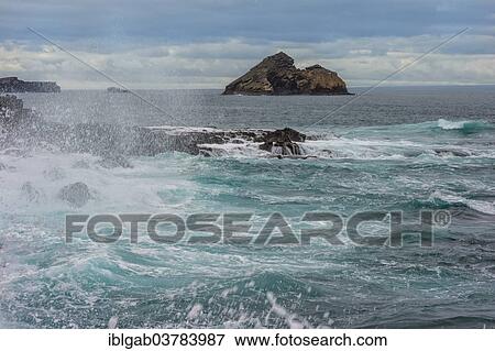 "Waves breaking on the coast of Chinaman's Hat Island off Santiago Island, Galapagos, Unesco World Heritage Site, Ecuador, South America" View Large Photo Image Stock Photo - "Waves breaking on the coast of Chinaman's Hat Island off Santiago Island, Galapagos, Unesco World Heritage Site, Ecuador, South America". Fotosearch