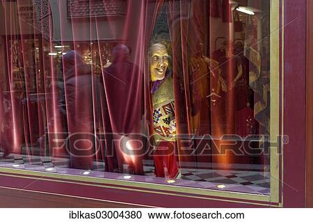 "Wax figure looking through a gap in the curtain, Musee Grevin waxwork museum, Passage Jouffroy, 9th Arrondissement, Paris, Ile-de-France, France, Europe" View Large Photo Image Stock Image - "Wax figure looking through a gap in the curtain, Musee Grevin waxwork museum, Passage Jouffroy, 9th Arrondissement, Paris, Ile-de-France, France, Europe". Fotosearch