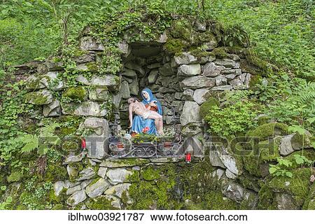 Stock Photo - "Wayside shrine between basalt blocks, ascent to the Milseburg, Danzwiesen, Hofbieber, Hesse, Germany, Europe". Fotosearch