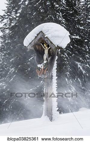 "Wayside shrine during a snowstorm, Obernberg am Brenner, Tyrol, Austria, Europe" View Large Photo Image Stock Image - "Wayside shrine during a snowstorm, Obernberg am Brenner, Tyrol, Austria, Europe". Fotosearch